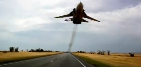 Fighter Aircraft Above Highway